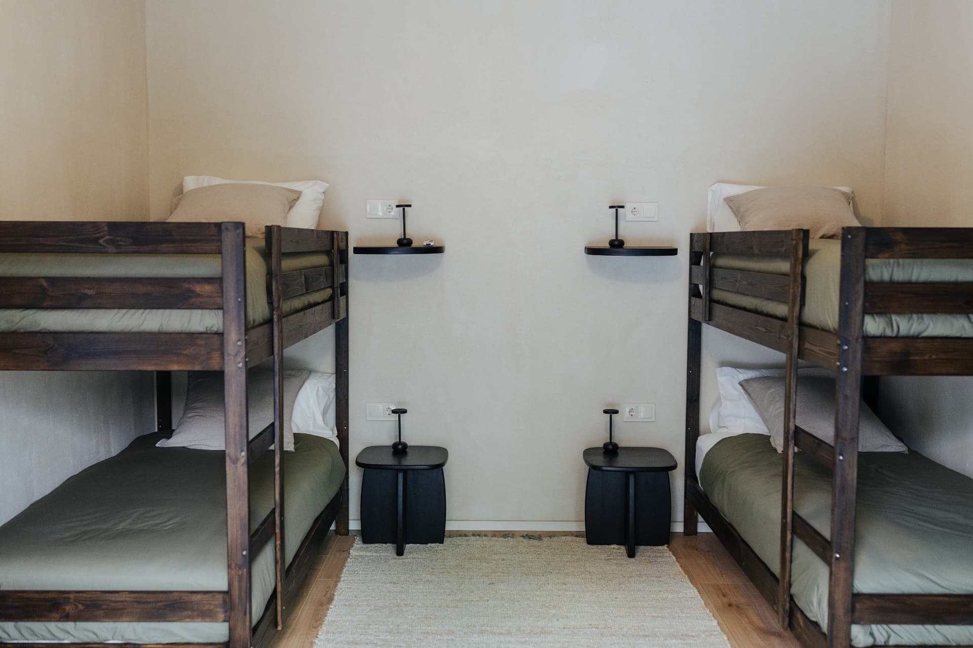 Family room with two solid wood bunk beds and natural linen bedding